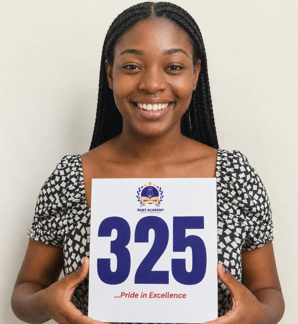 BART ACADEMY student holding a JAMB score card of 325